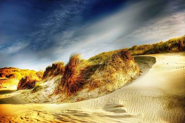 Nordseedünen  - Luftzeitalter, der Wind treibt die Dünen vor sich her und verändert die Landschaft